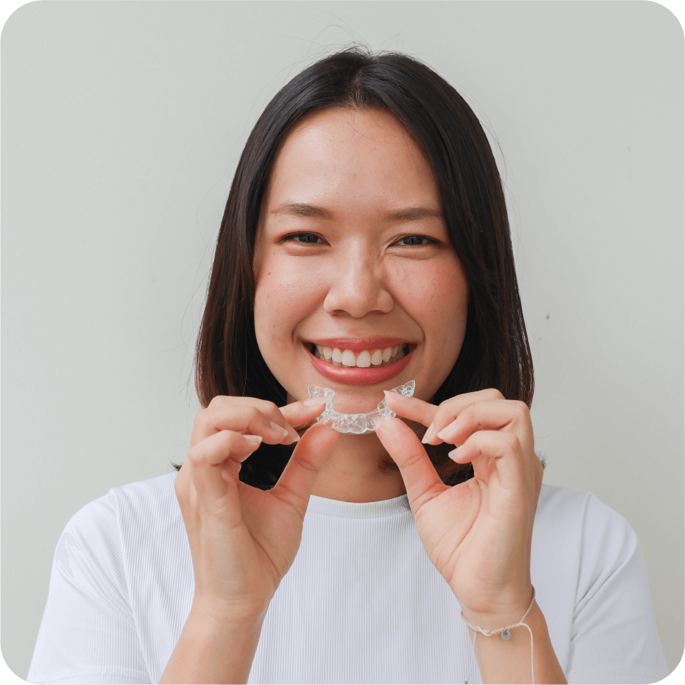 Dentist high-fiving patient